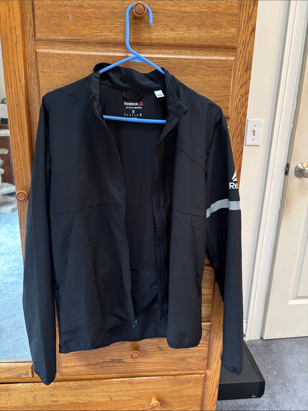Reebok Black womens Performance Full-Zip Jacket with Reflective Stripe